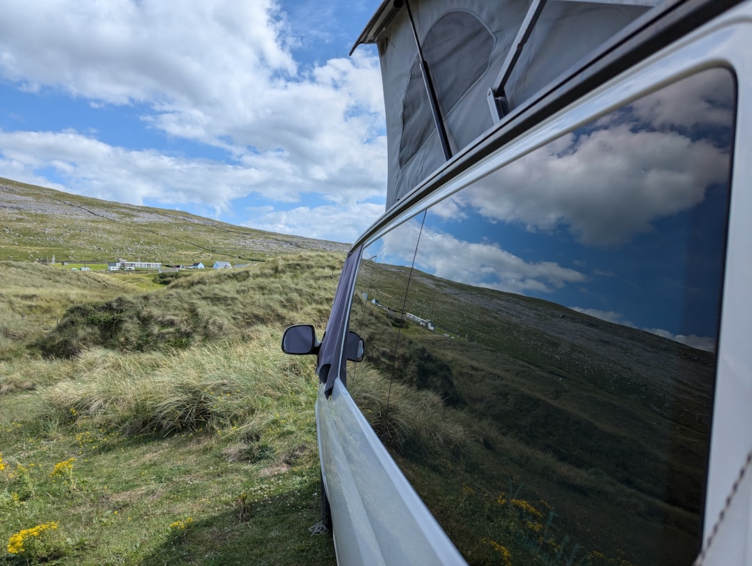 A van parked on the side of a road